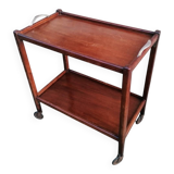 Art Deco wooden serving trolley on wheels.