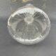 Vintage transparent glass vase in flower shape.
