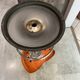 Orange tractor stool, pivoting adjustable mower, Fermigier Mirima 70.