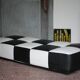 Roche Bobois black and white checkered leather bench, low bench.