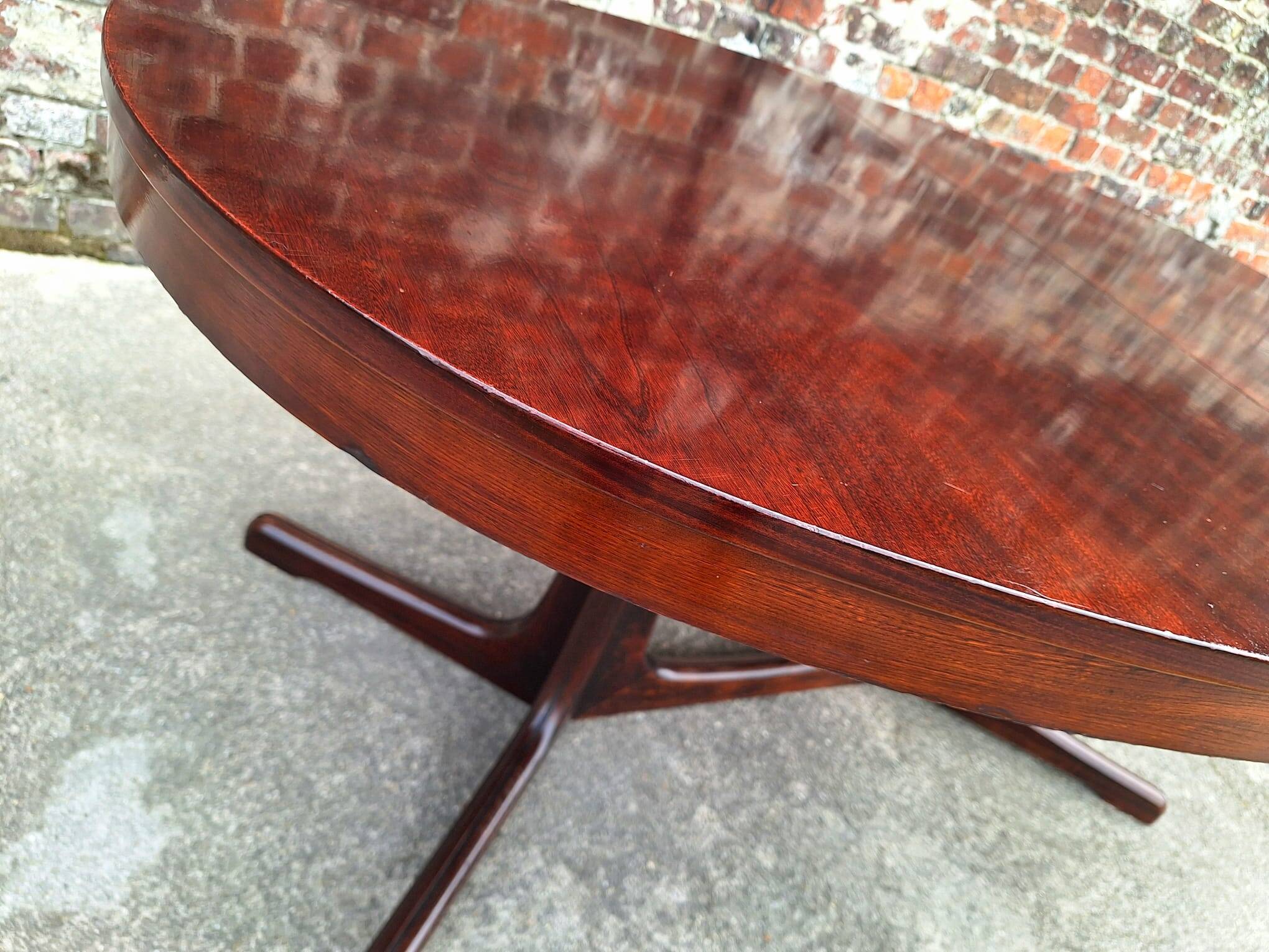 Large vintage Baumann table in rosewood with extensions, antique furniture.