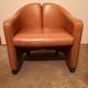 Pair of leather armchairs by Eugenio Gerli