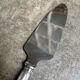 Christofle silver-plated pie server, "Spatours" pattern.