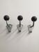 Vintage ball hooks, metal and Bakelite