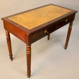 Bureau plat en acajou xixème dessus cuir