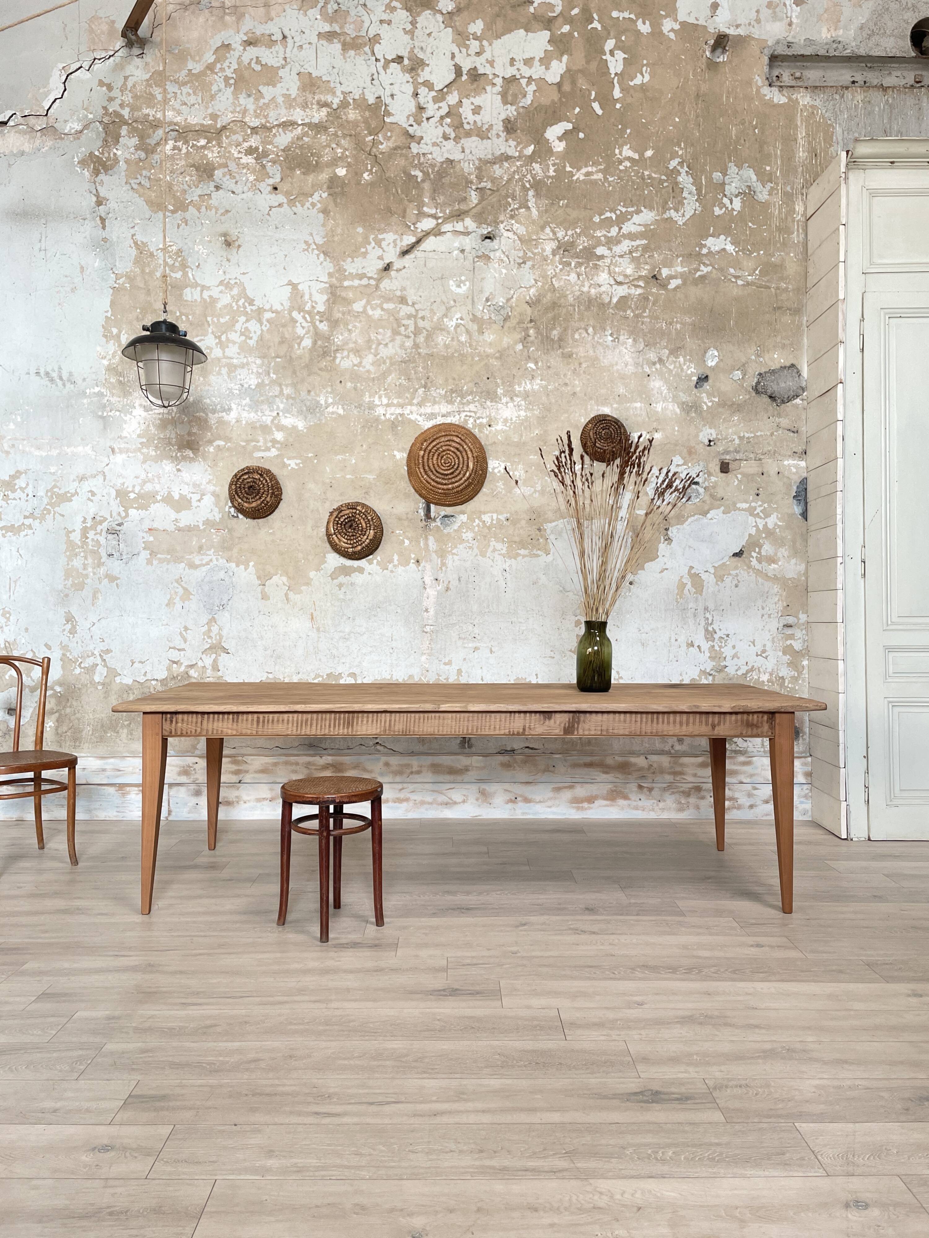 Vintage farm table with spindle legs.