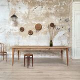 Vintage farm table with spindle legs.