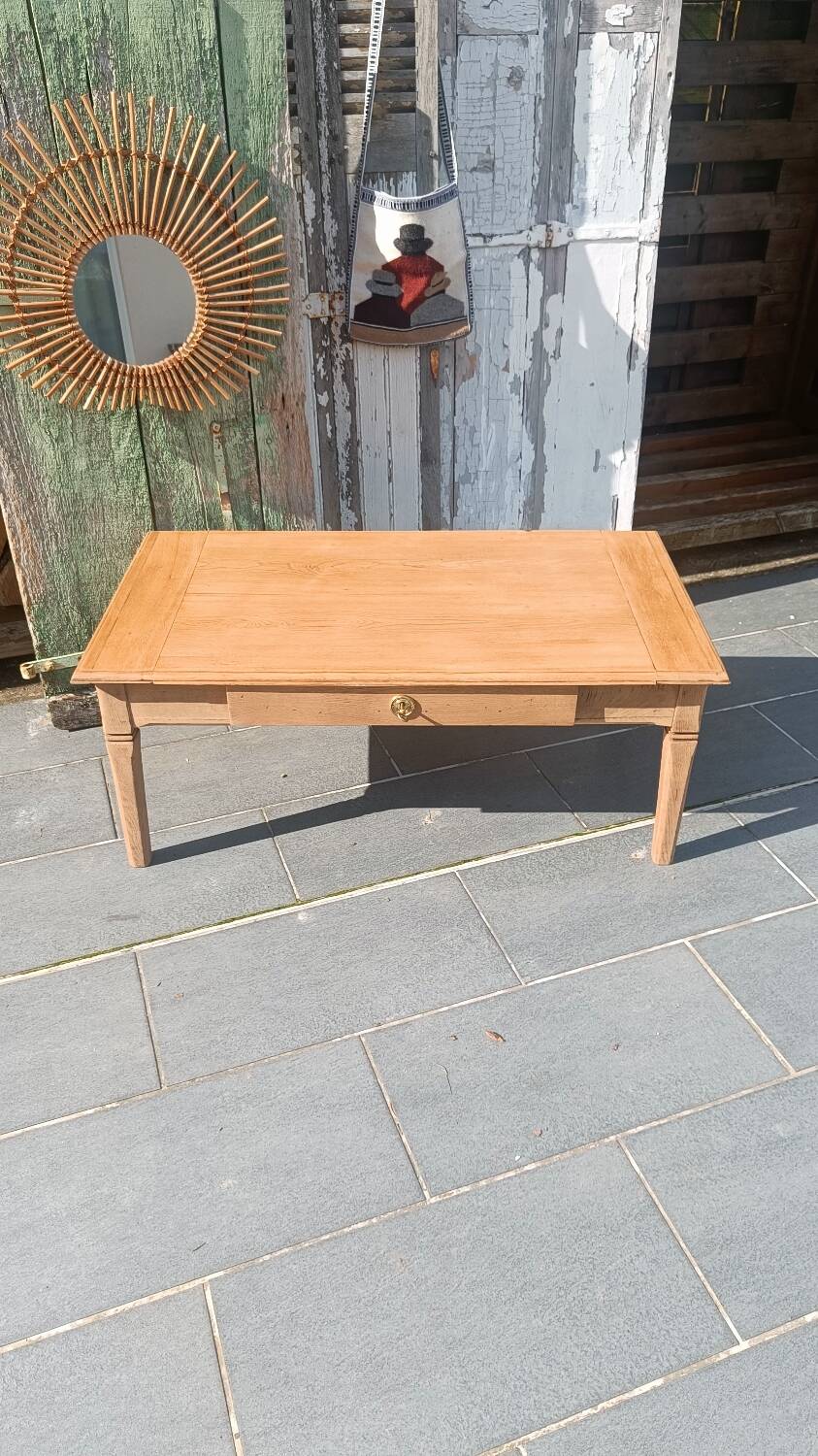 Solid wood coffee table with drawer and original key.