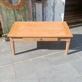 Solid wood coffee table with drawer and original key.