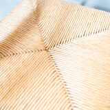 2 low bedroom chairs in hand-woven rice straw, 1950s/1960s