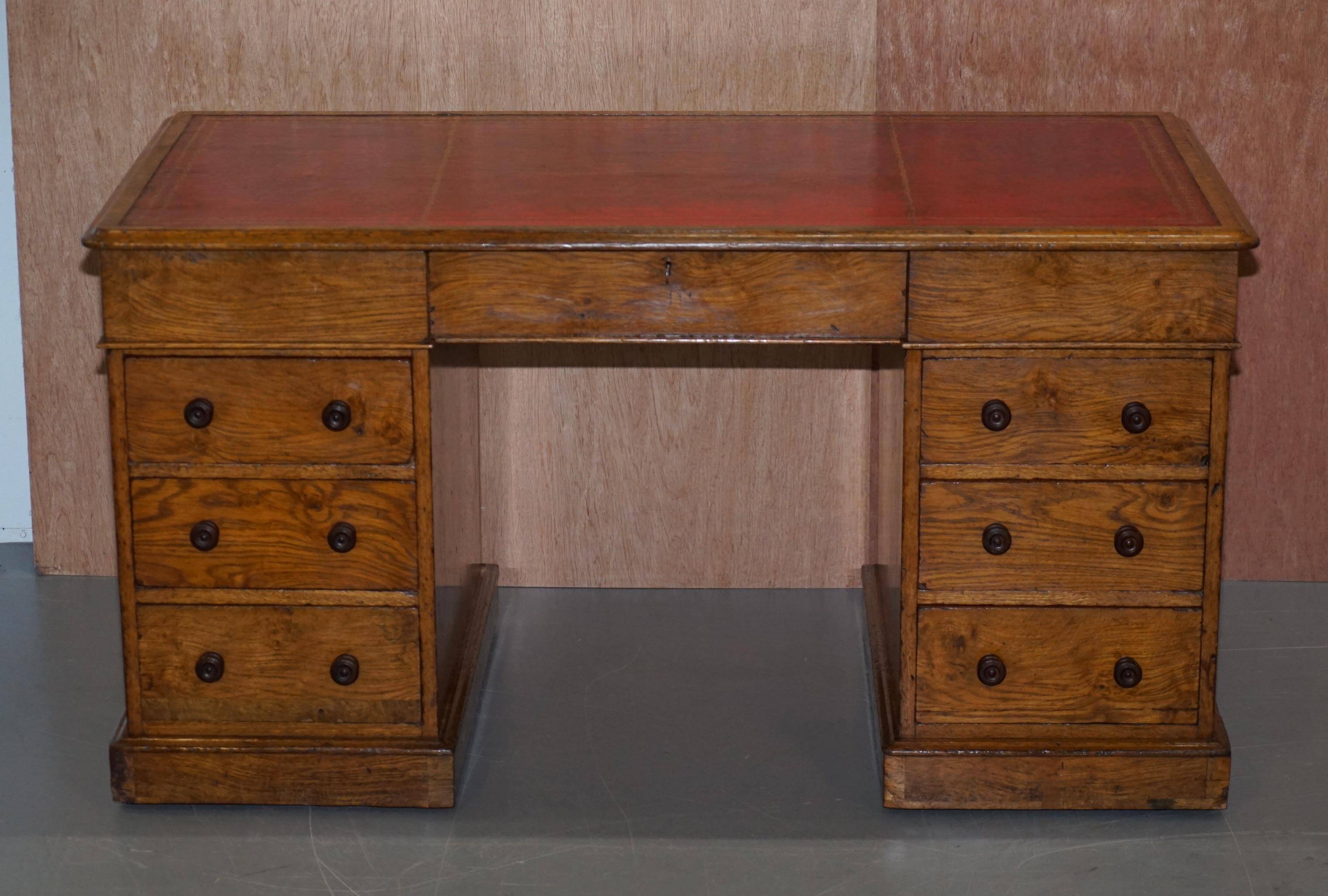 Rare oak partner's desk by Howard & Sons circa 1880 with leather.
