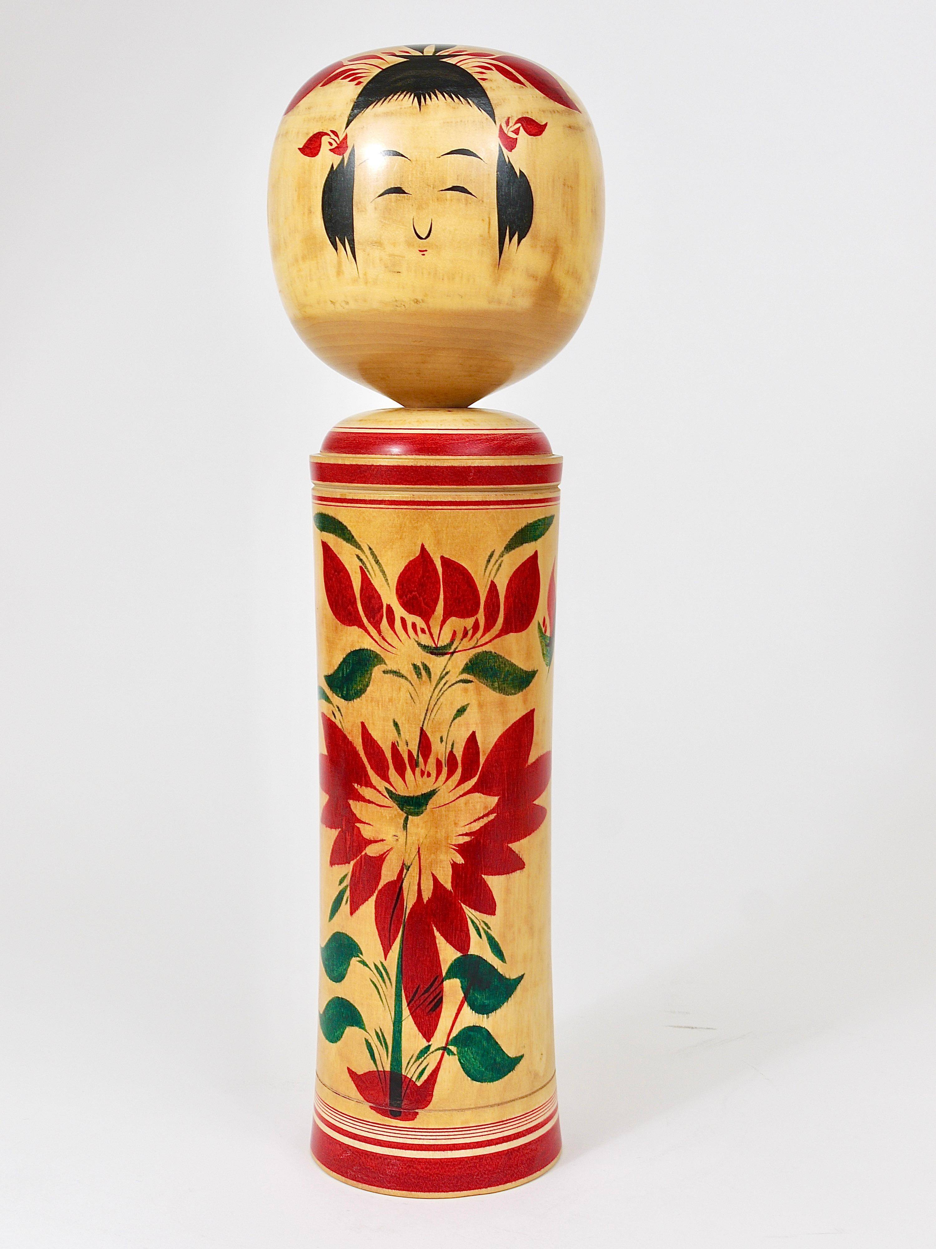 Decorative Naruko Kokeshi doll sculpture from northern Japan, hand-painted.