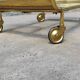 Old rolling coffee table serving vintage brass bar 50s mid-century design