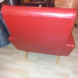 Armchair in red leatherette and feet compass around 1950