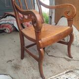 Mulched armchair of golden rye in solid walnut period Restoration around 1820