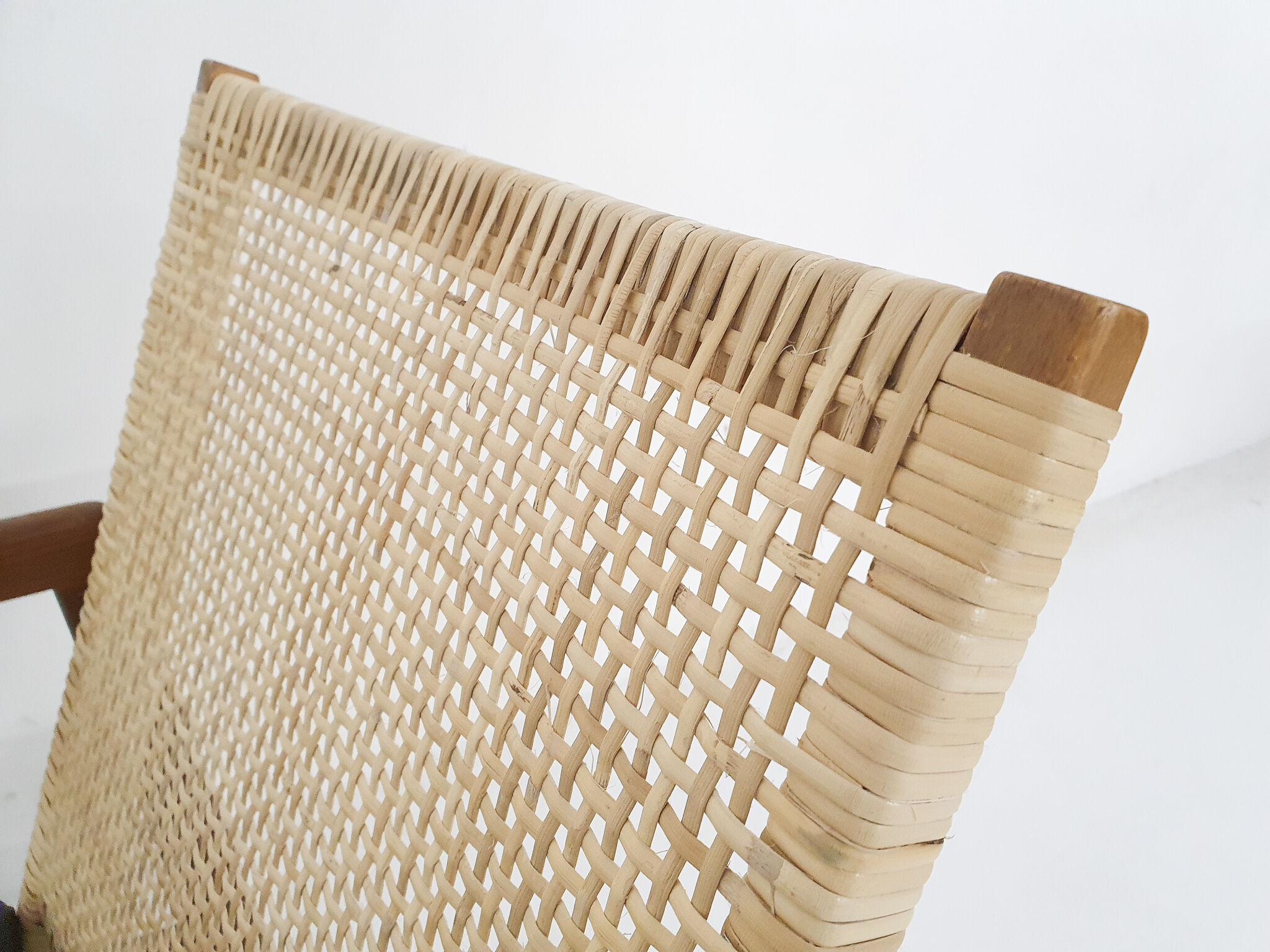 Rattan and leather low-back lounge chair by P.J. Muntendam for Gebr. Jonkers, The Netherlands 1950's