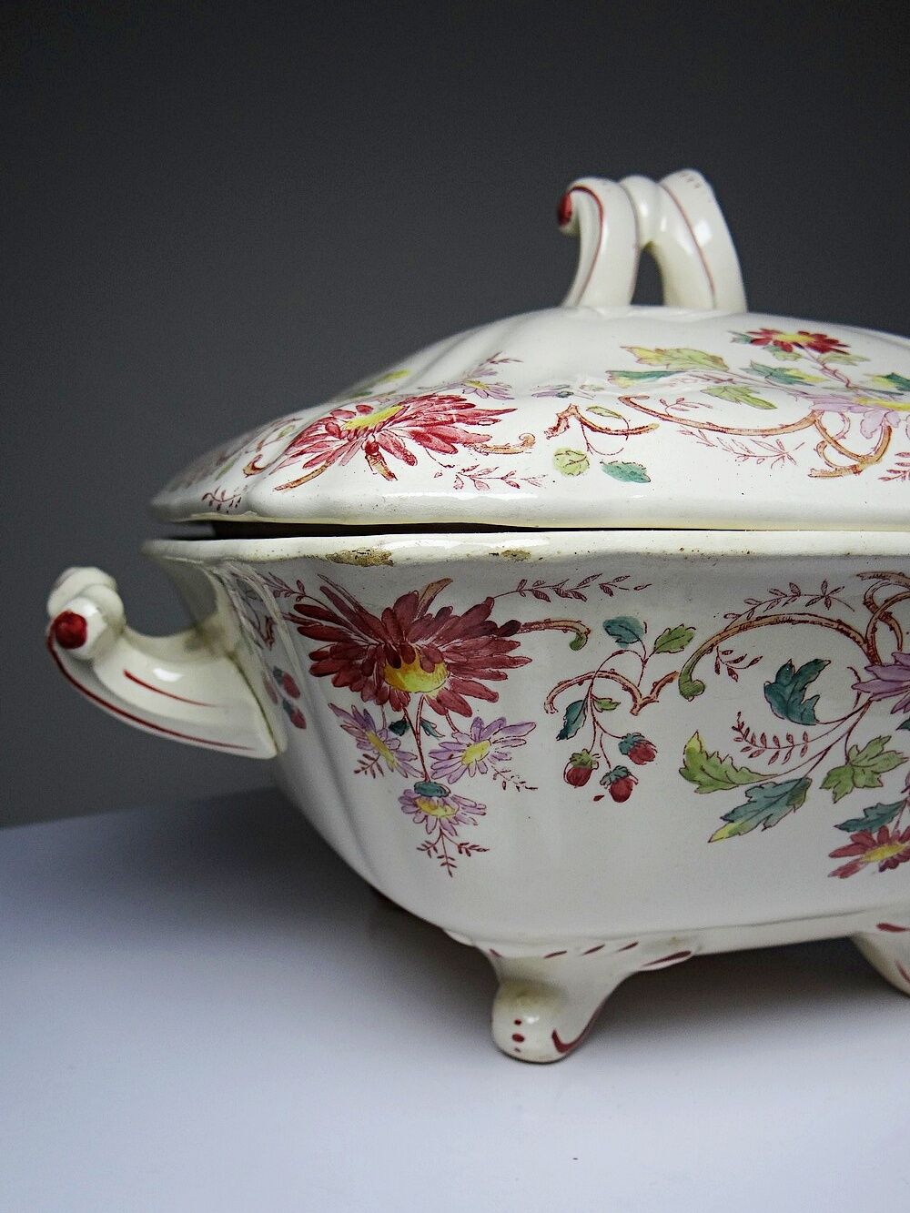 Antique Longchamp soup tureen/vegetable dish with polychrome daisies in ironstone.