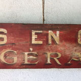 Painted wood sign