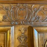 Wedding wardrobe of the Bressan country in walnut and walnut magnifying glass dated 1850