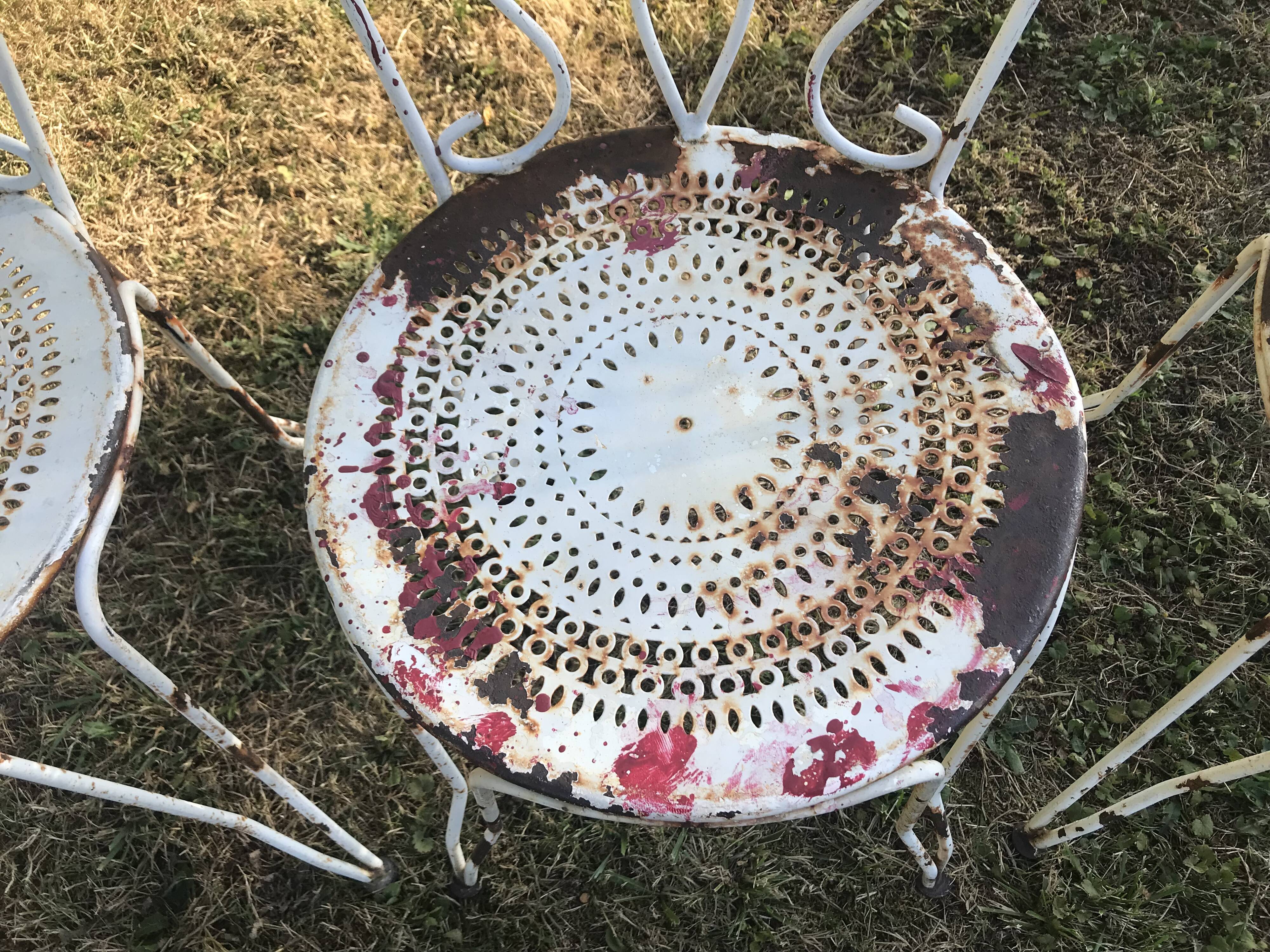 4 wrought iron garden chairs