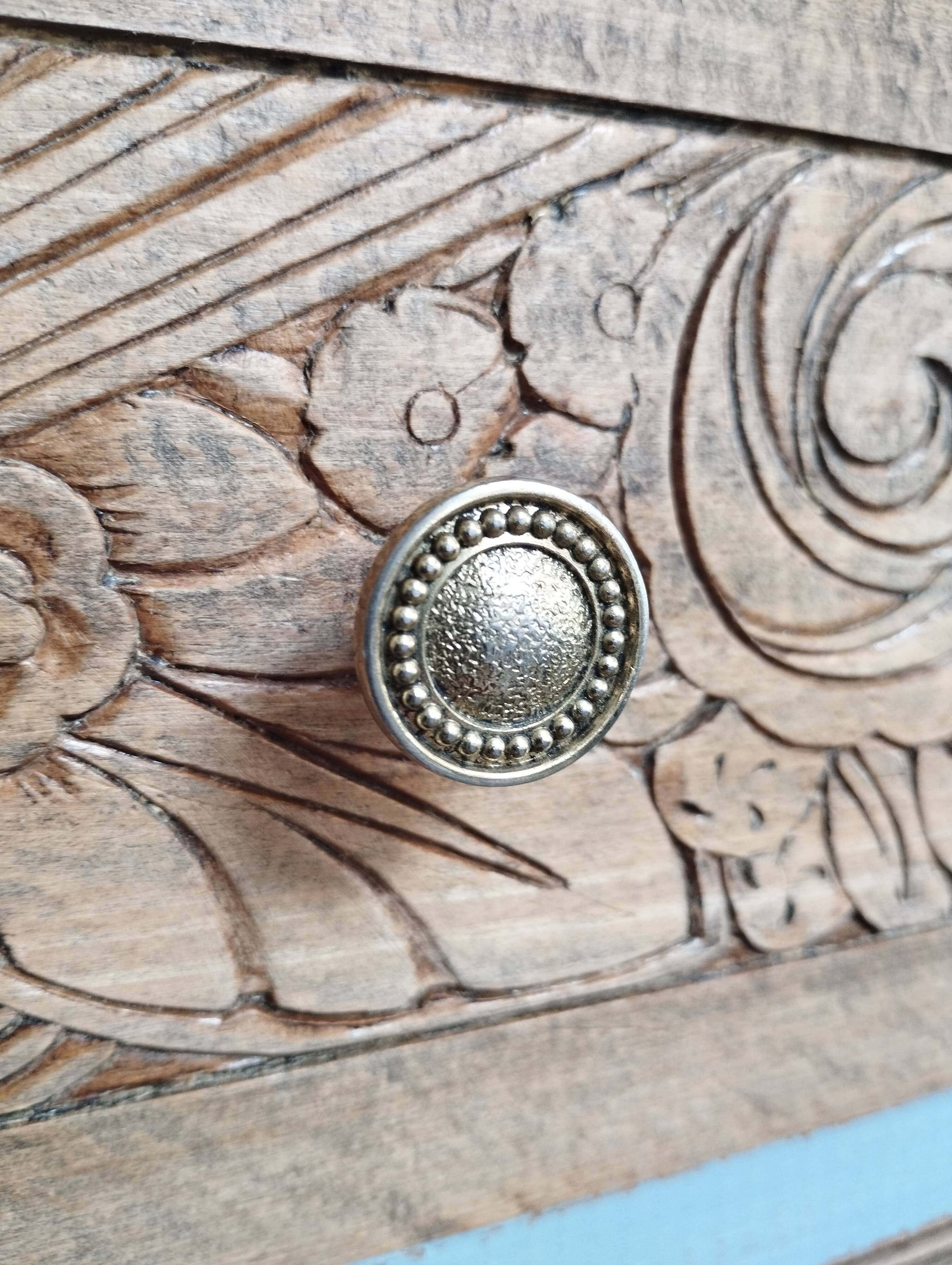 Small carved wood chest of drawers