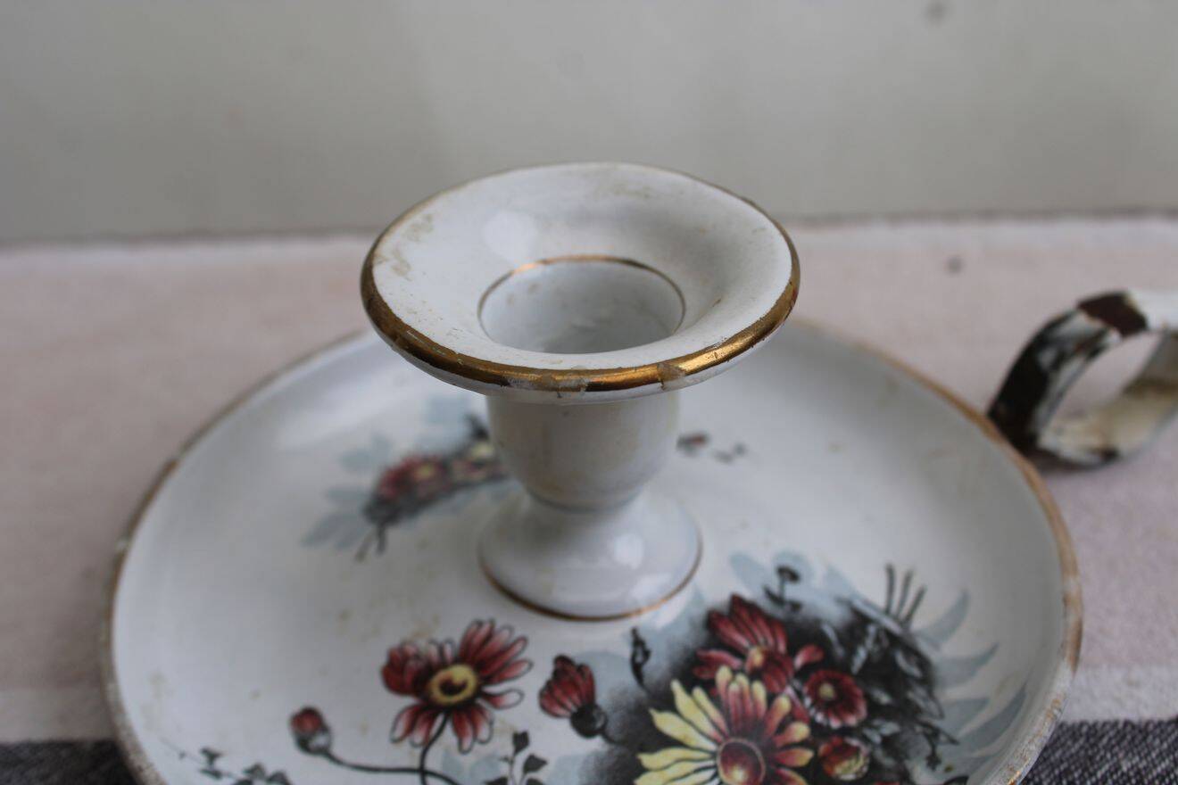 Antique enamel candle holder