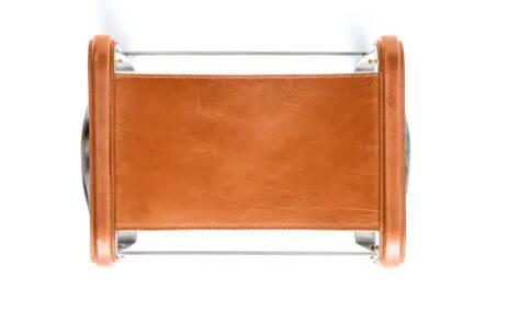 Contemporary bar stool in aged silver steel and natural tobacco leather.
