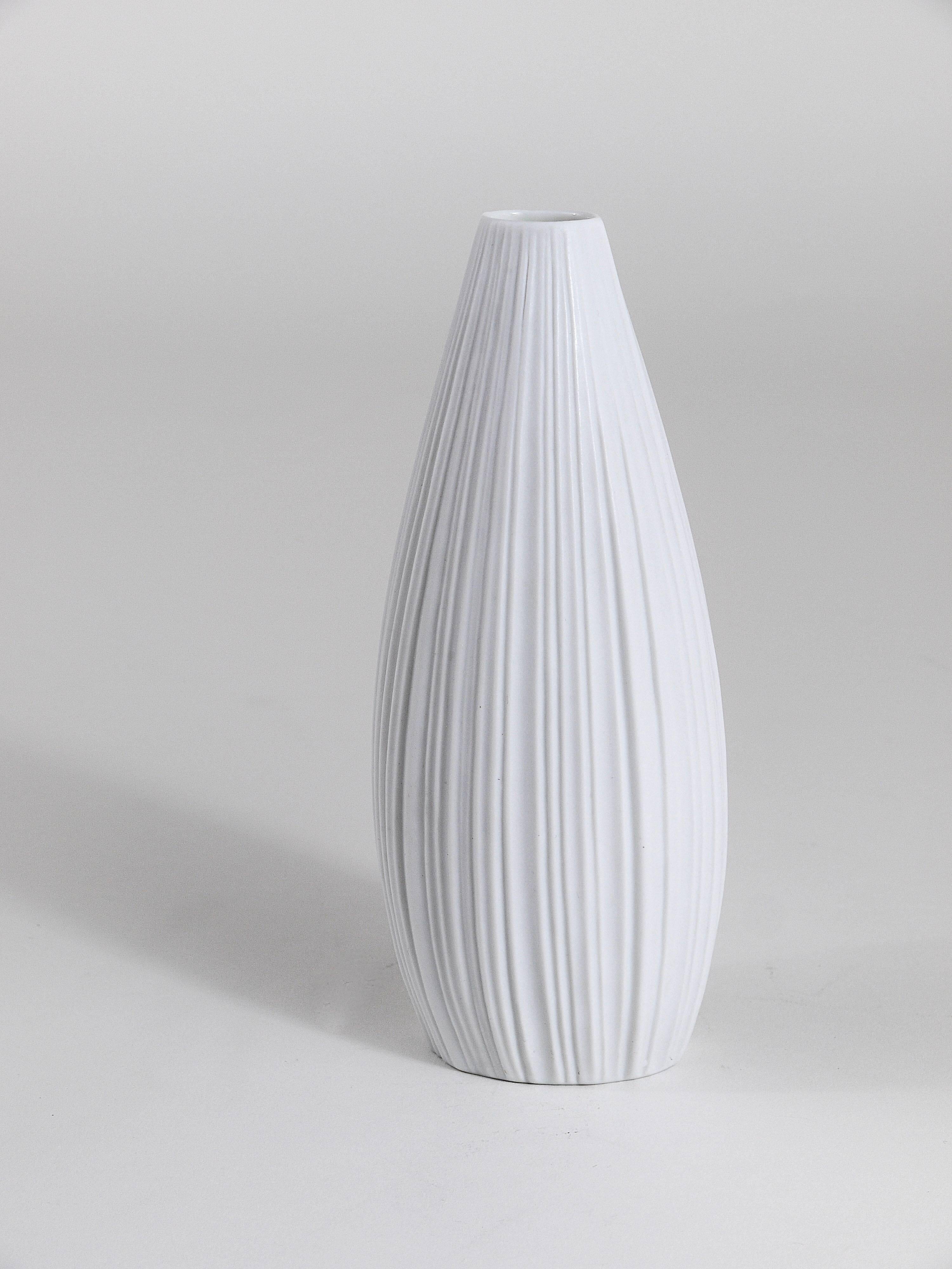 White porcelain vase with striped relief by Rosenthal, designed by Martin Freyer, Germany, 1960s.