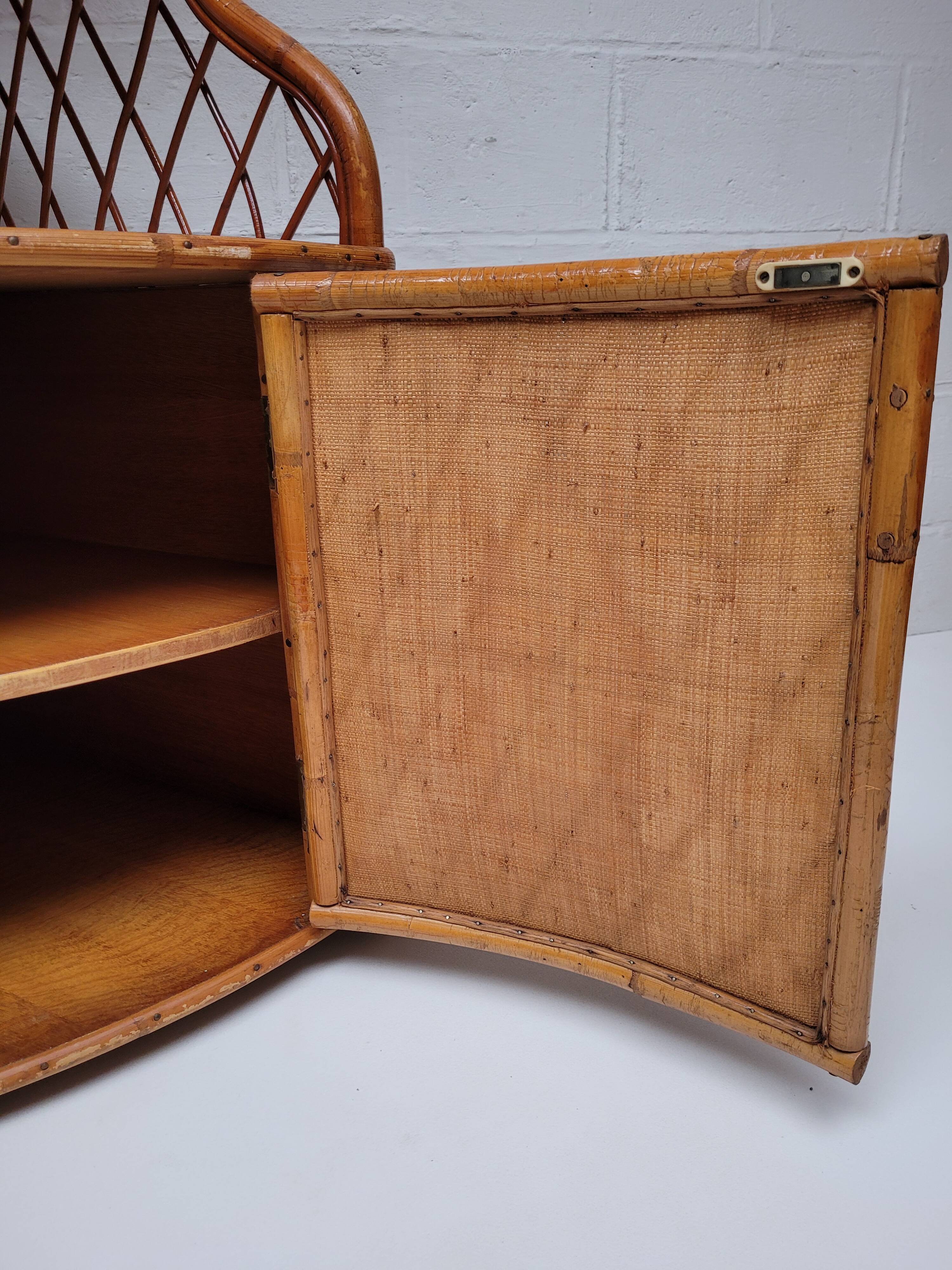 1960s vintage corner rattan bookshelf