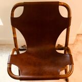 Pair of leather and bamboo armchairs