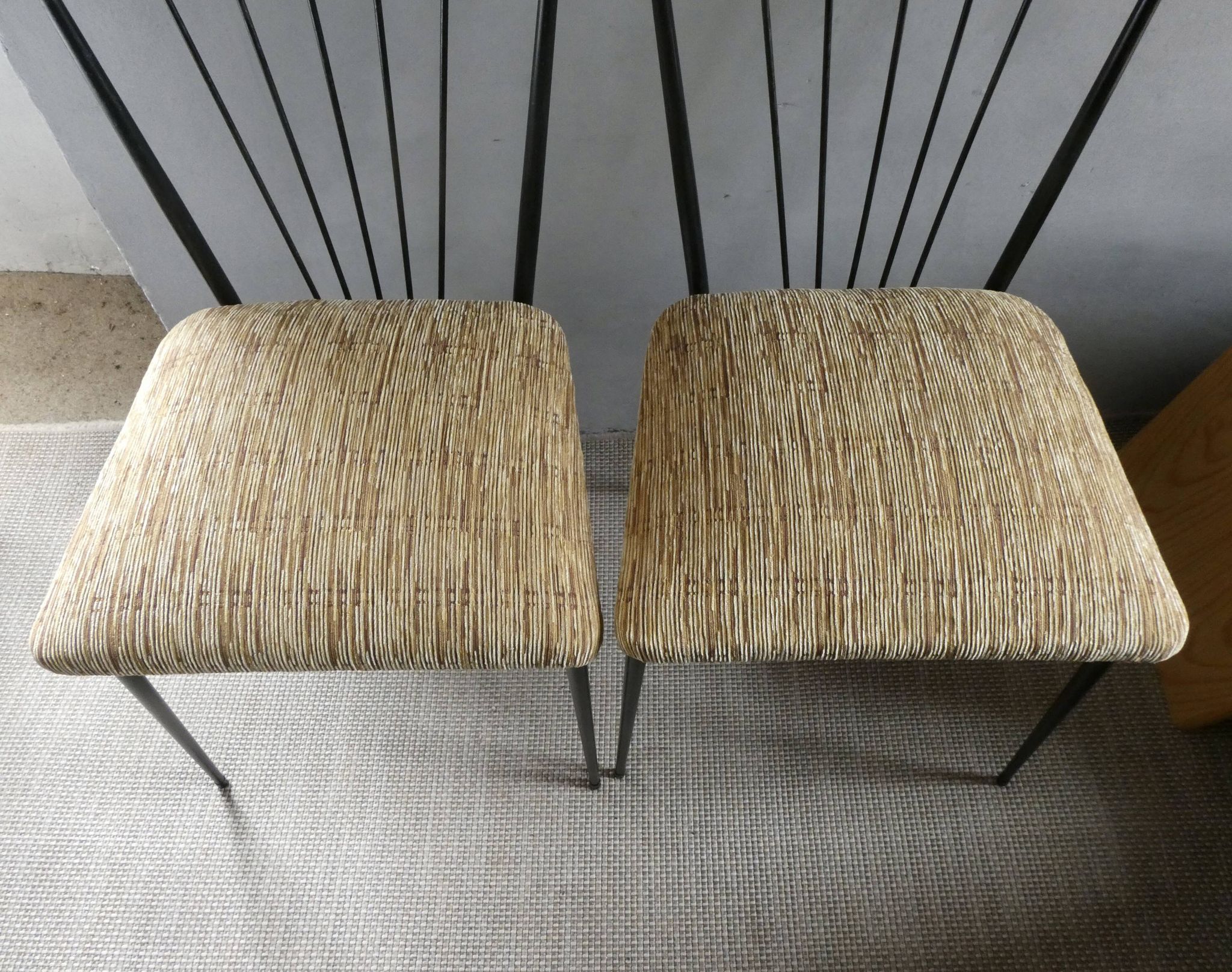 Pair of Colette Gueden chairs, black metal and fabric.
