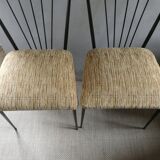 Pair of Colette Gueden chairs, black metal and fabric.