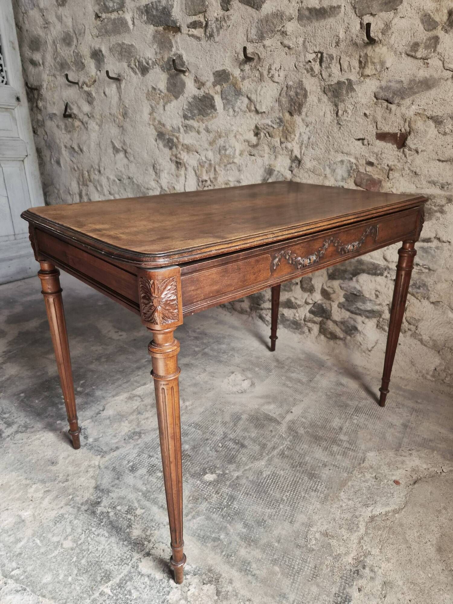 French antique writing desk in walnut, Louis XVI style, late 19th century, circa 1880–1900.