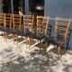 6 chaises bois et skaï noir années 60