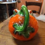 Orange slipware pitcher