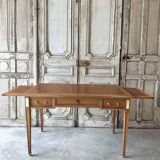 Directoire style flat desk circa 1960 in light cherry wood.