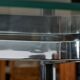 Sculpted Chrome Base Coffee Table with Glass Top
