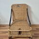 Vintage foldable beach chair, picnic in rattan and leather.