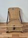 Vintage foldable beach chair, picnic in rattan and leather.