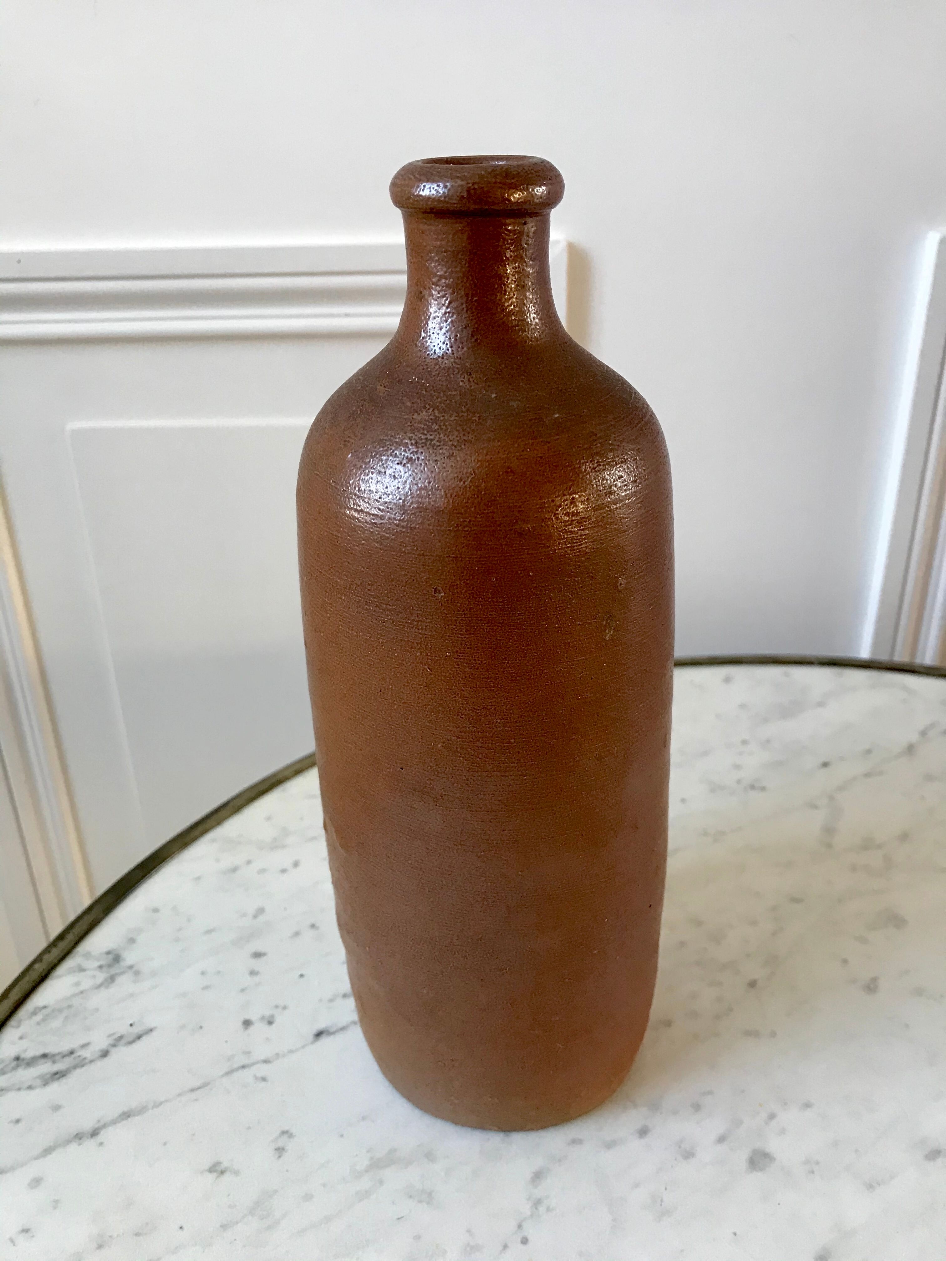 Stoneware bottle handmade early twentieth century