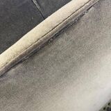 Vintage green two-seater sofa with fringes