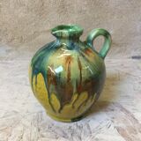 Yellow pitcher with green drips