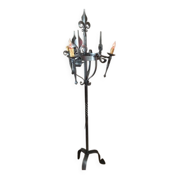 Medieval-style floor lamp, made of wrought iron.