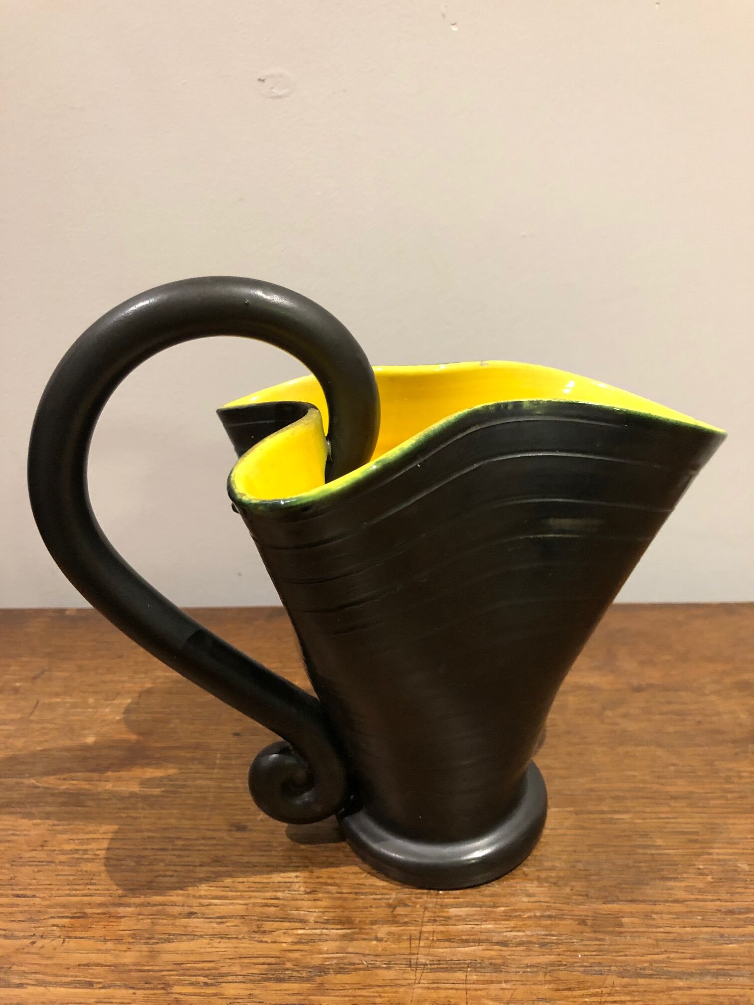 black and yellow vallauris pitcher