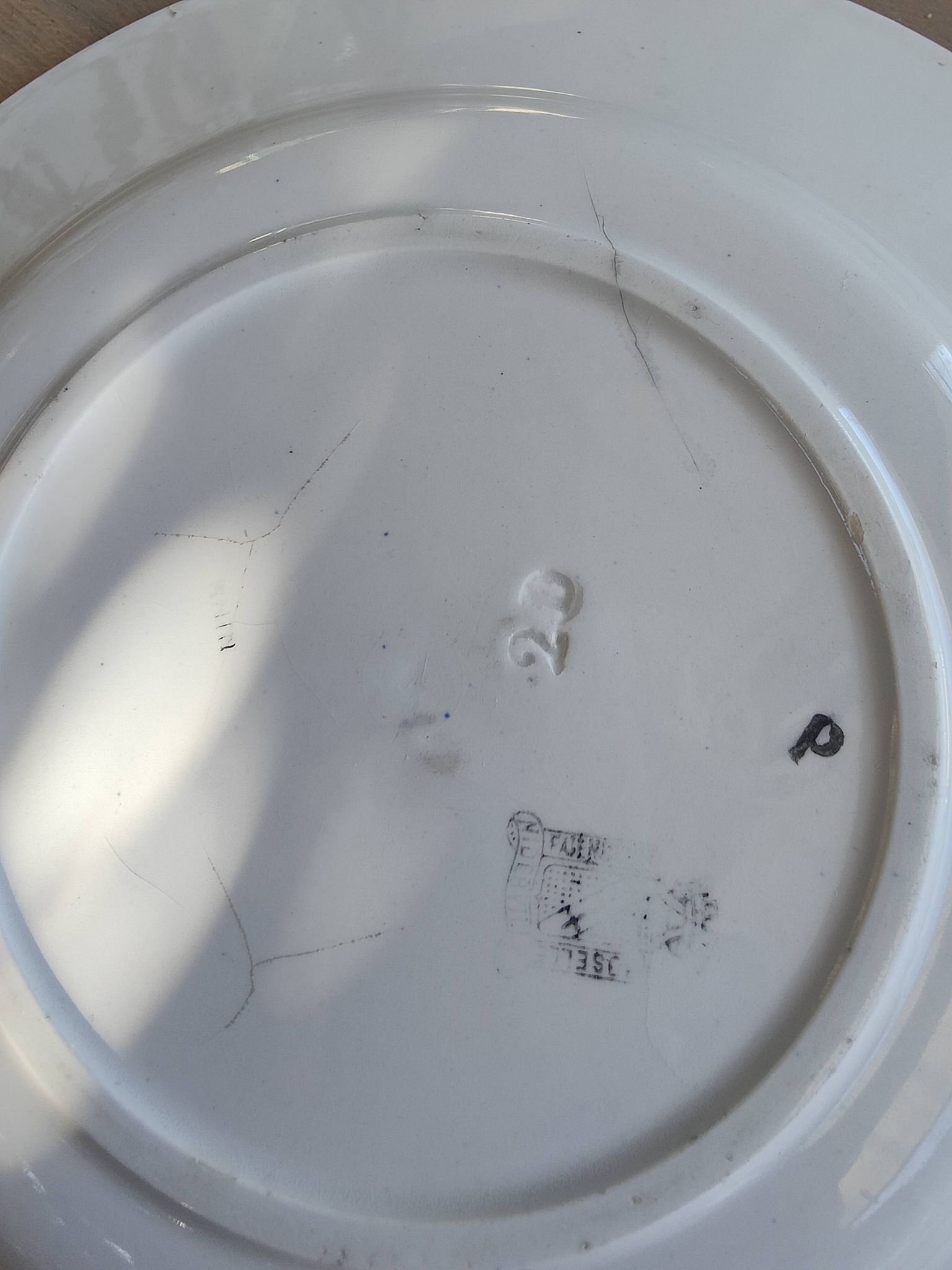 Set of 3 iron earth flat plates Faïencerie Niderviller. Blue and white “Art Deco” decor.