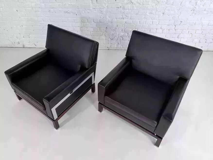 Pair of 50s-60s armchairs in imitation leather, wood and chrome