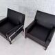 Pair of 50s-60s armchairs in imitation leather, wood and chrome