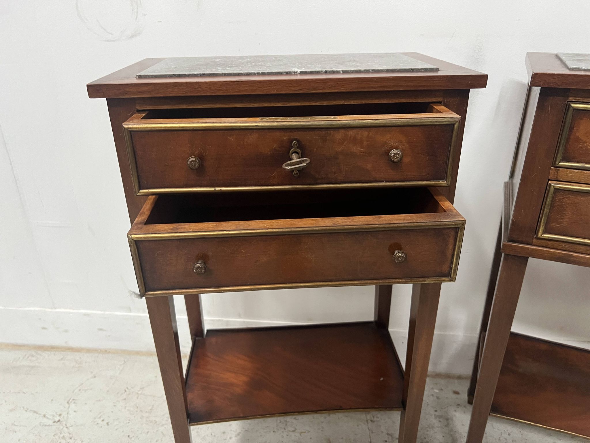Pair of Louis XVI style bedside tables in mahogany and veneer, 20th century