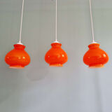 Trio of vintage orange opaline pendant lights, 1960-70
