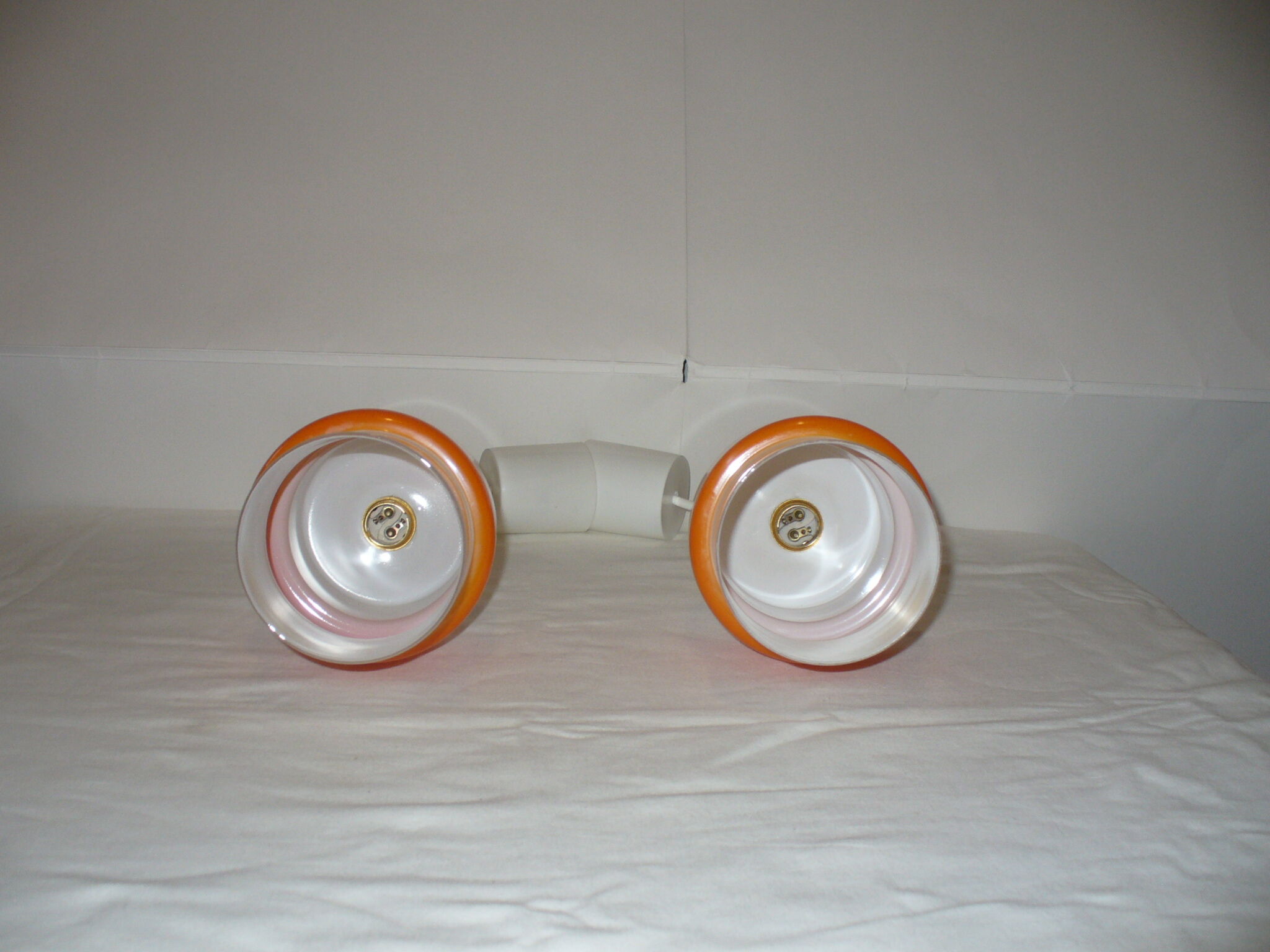 Pair of orange suspensions from the 70s